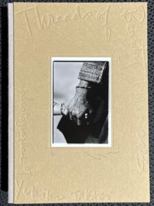 高木由利子×青幻舎による豪華特装本。本展にあわせて先行販売される写真集『Threads of Beauty 1995-2025 ― 時をまとい、風をまとう。』（青幻舎）に加えて、異なる30種類のオリジナルプリントが表紙に施された、世界に1冊だけの豪華特装版を販売。会場限定で抽選販売。