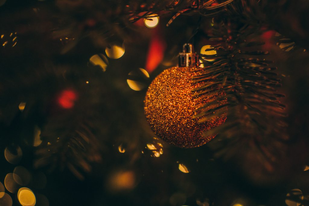 Photo of Christmas tree, ornaments shining.
