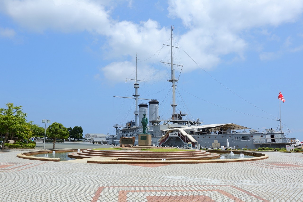 The battleship Mikasa and the statue of Admiral Togo Heihachiro at Mikasa Park in Yokosuka, symbolizing Japan's naval history and legacy.