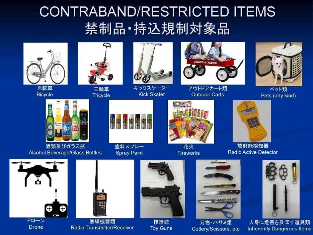 Poster showing contraband and restricted items prohibited at Yokosuka Spring Festival, including bicycles, kick scooters, pets, alcohol bottles, fireworks, drones, radios, toy guns, knives, and other dangerous items.
